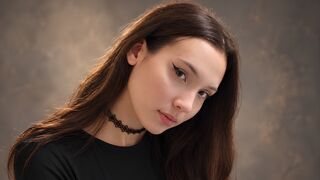 Amelie Voss deep brown eyes video chat