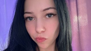 Evie Laine piercing blue eyes closeup