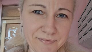 Kitti Elisson icy blue eyes gaze