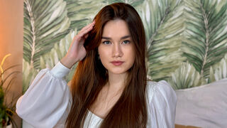 Stella Pierce brunette with green eyes cam